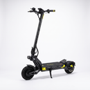 A black electric scooter with bright yellow accents, shown from a three-quarters angle on a clean white studio background. The brand name 'Biclete' is visible on the deck.