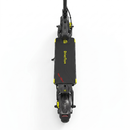 A top-down view of a black electric scooter with yellow and red accents, branded 'Drivetron', on a solid white background.
